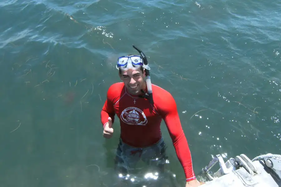 Snorkel guide assisting guests in the Laguna Madre
